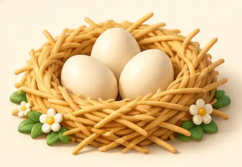 Un nido di paglia con tre uova